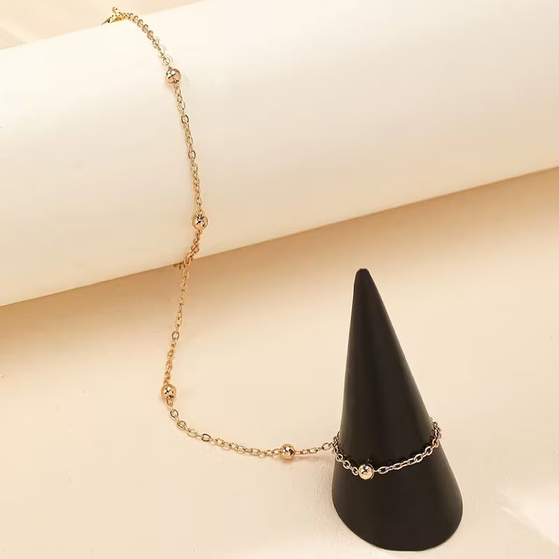 Anneau de chaîne de perles dorées